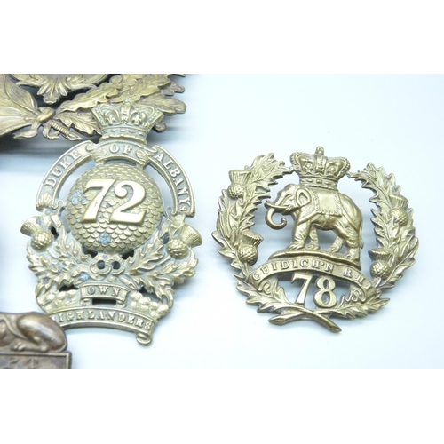 990 - Victorian British Army helmet plates and cap badges