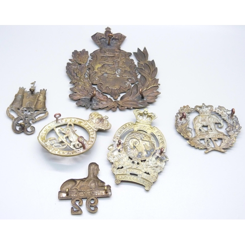 990 - Victorian British Army helmet plates and cap badges