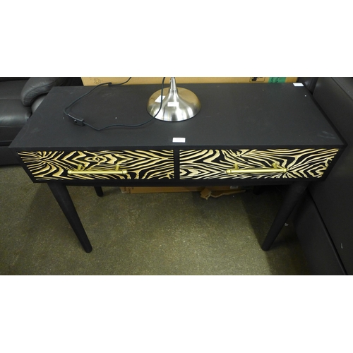 1469 - A zebra design and black console table