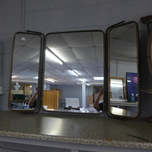 1481 - An industrial style triple mirror