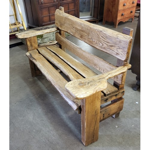 229A - A rustic hardwood garden bench