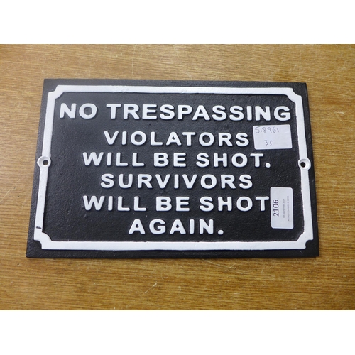 2106 - A No Trespassing cast metal sign * This lot is subject to VAT