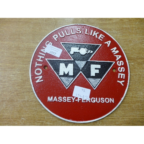 2107 - A Massey-Ferguson cast metal sign * This lot is subject to VAT