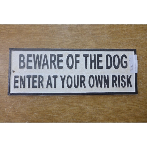 2110 - A 'Beware of the Dog' cast metal sign * This lot is subject to VAT