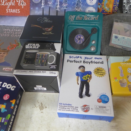 2115 - A box of assorted items including- star wars, games, books, mugs etc.