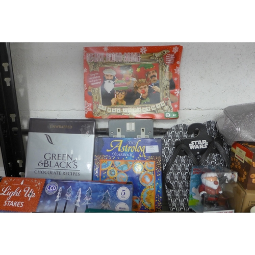 2115 - A box of assorted items including- star wars, games, books, mugs etc.