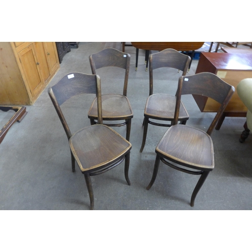 103 - A set of four early 20th Century beech bentwood chairs