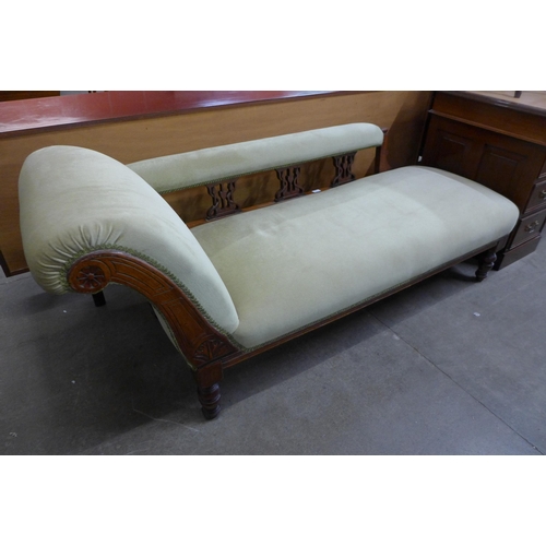 104 - An Edward VII walnut and green fabric upholstered chaise longue