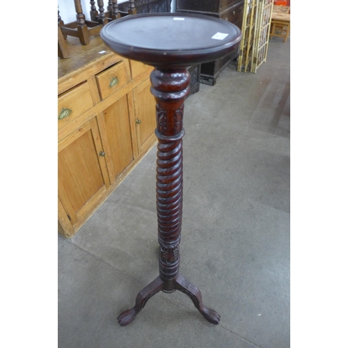 106 - A French style hardwood barleytwist jardiniere stand