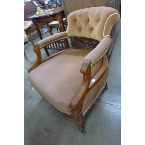 110 - A pair of Edward VII walnut and beige fabric upholstered tub chairs