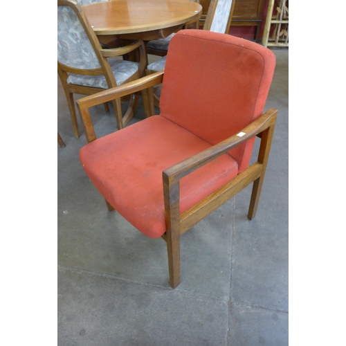 13A - A pair of teak elbow chairs