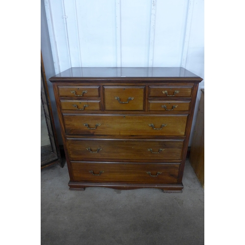 153 - A late Victorian walnut chest of drawers