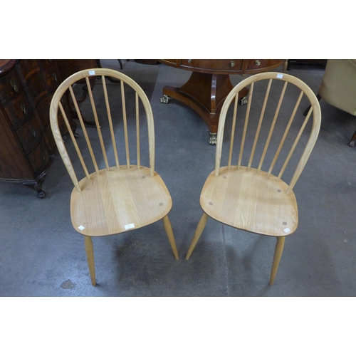 19 - A pair of Ercol Blonde ash Windsor chairs