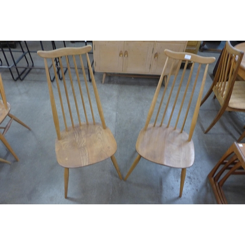 20 - A pair of Ercol Blonde elm and beech Goldsmith chairs