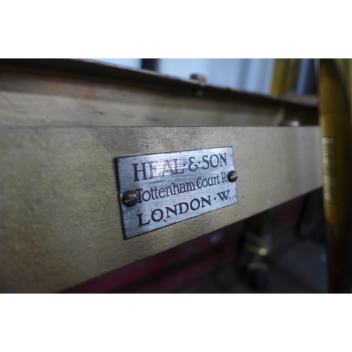 206 - A Victorian style brass single bed, retailed by Heal & Son, London