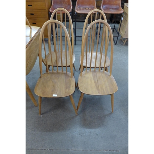 21 - A set of four Ercol Blonde elm and beech Quaker chairs