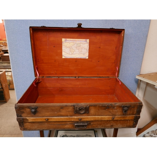 215 - An early 20th Century banded steamer trunk