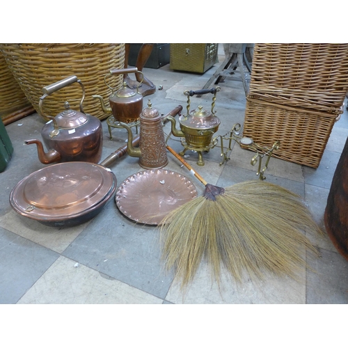 242 - An Arts and Crafts Newlyn style brass and copper spirit kettle on stand, two copper kettles, brass t... 