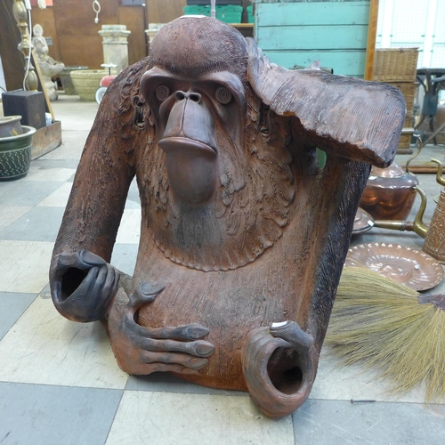 246 - A terracotta figure of an orangutan