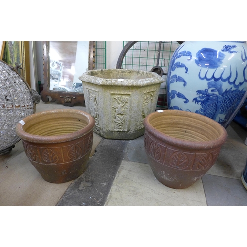 248A - A pair of terracotta garden plant pots and a concrete planter