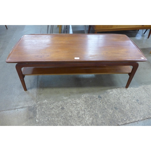 25 - A Danish Mogens Kold teak two tier rectangular coffee table, designed by Arne Hovmand Olsen