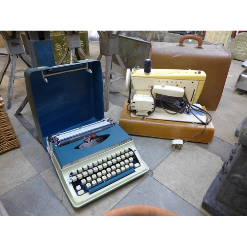 258 - An Imperial typewriter and a Singer sewing machine