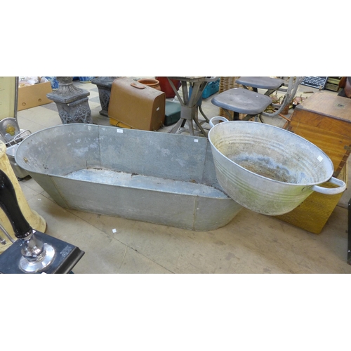 261 - A galvanised bath and a small bath