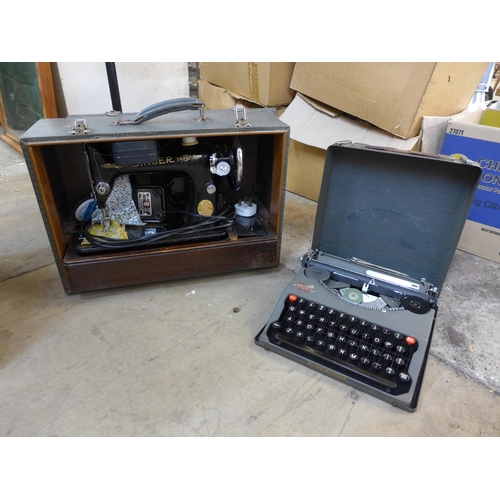 263 - A cased Singer sewing machine and an Imperial typewriter