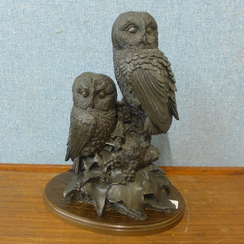 364 - A Heredities resin owl figure group