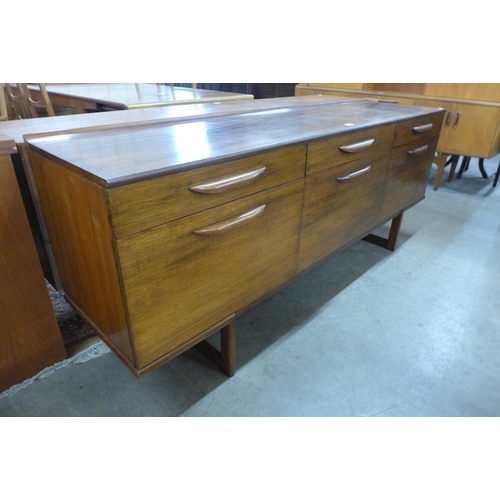 37 - A teak sideboard