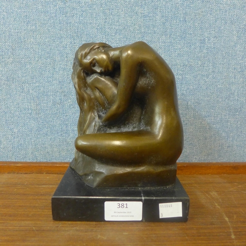 381 - An Art Deco style bronze figure of nude lady kneeling, on black marble socle