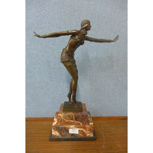 382 - An Art Deco style bronze figure of a female dancer, on rouge marble socle