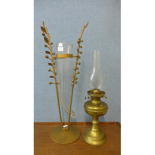 385 - A glass cornucopia vase on gilt metal stand and a brass table lamp