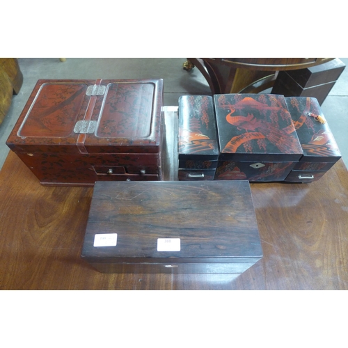 388 - A Victorian rosewood tea caddy and two oriental lacquered jewellery boxes