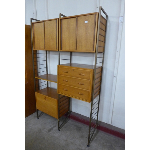 42 - A Staples teak and metal Ladderax room divider