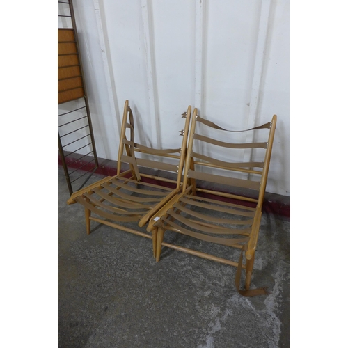 43 - A pair of Ercol Blonde beech 427 model lounge chairs