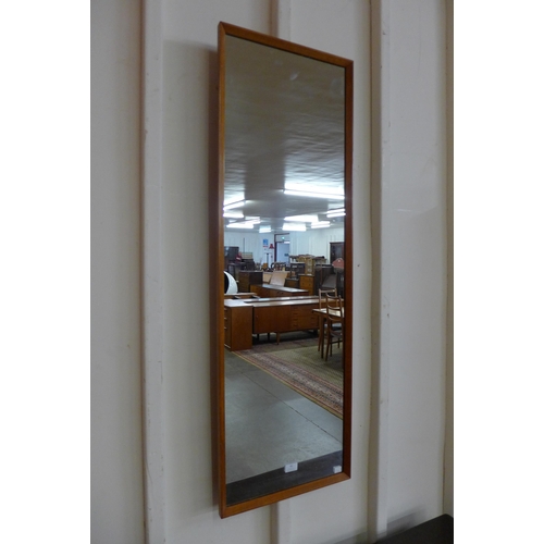 46 - A rectangular teak framed mirror