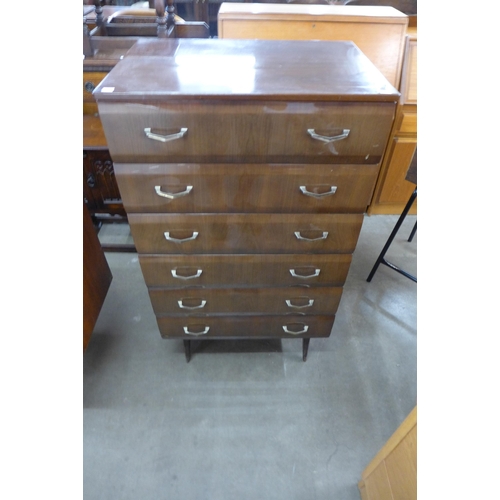 51 - A Meredew tola wood chest of drawers