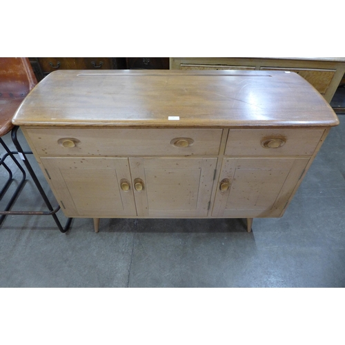 58 - An Ercol Blonde elm and beech Windsor sideboard