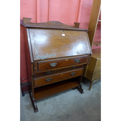 71 - An Arts and Crafts mahogany bureau