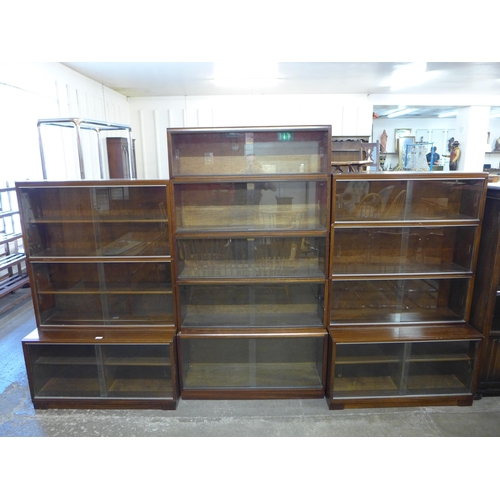 82 - Two Minty Oxford mahogany three tier sectional stacking bookcases and a Simplex mahogany five tier s... 