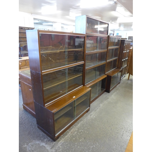 82 - Two Minty Oxford mahogany three tier sectional stacking bookcases and a Simplex mahogany five tier s... 