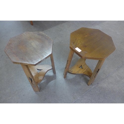 84 - A pair of Arts and Crafts oak octagonal occasional tables, manner of Libertys