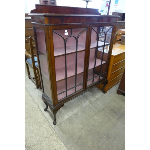 91 - An Edward VII mahogany two door display cabinet