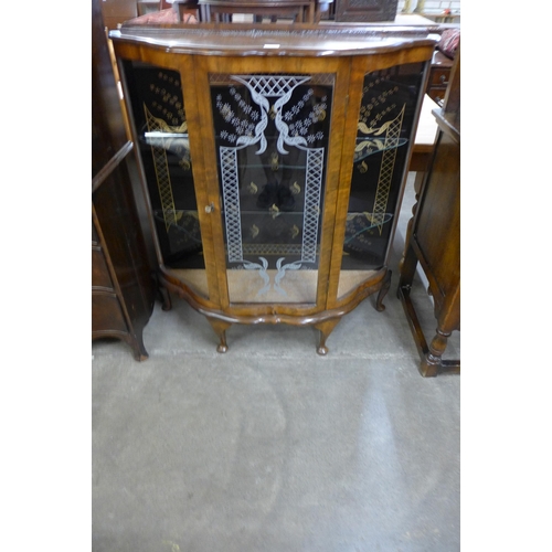 95 - A walnut display cabinet