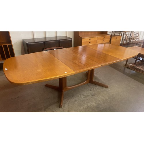 8 - A Danish Gudme Mobelfabrik teak extending dining table