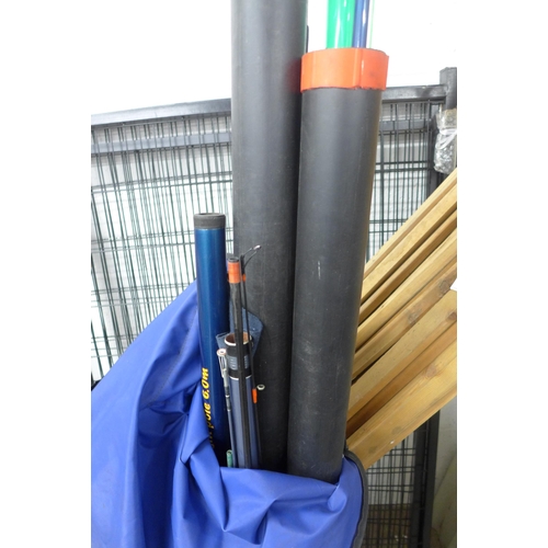 2455 - A fishing bag with rods and poles