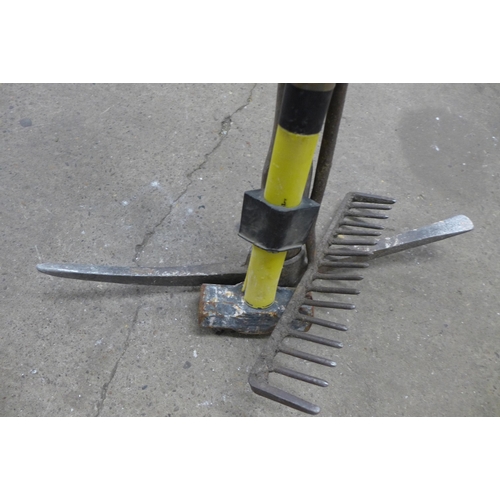 2457 - A garden lot:  a large fork, pick axe and a sledge hammer