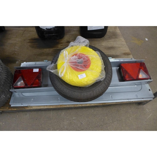 2470 - Trailer parts including hinged doors, a trailer wheel and a wheelbarrow wheel