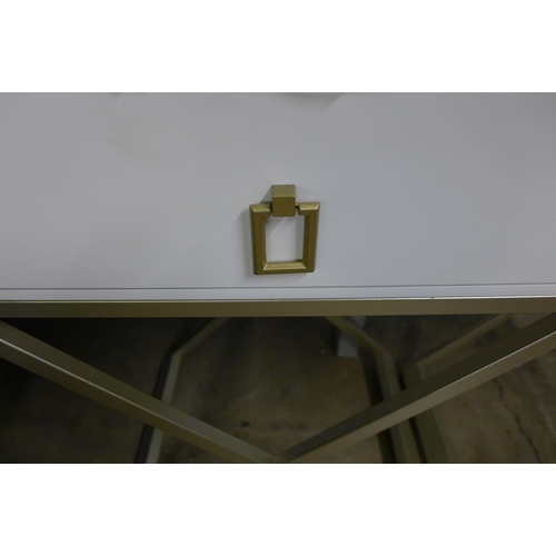 1431 - A pair of white bedside tables with gold legs